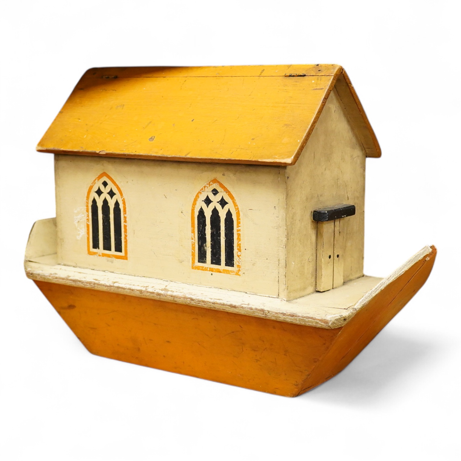 A First World War ‘War Relief Toy Work’ painted pine Noah's Ark with a quantity of carved and painted wooden animals, the ark with hinged lid, label pasted to the inside of the lid stating; Made in England, with a biblic
